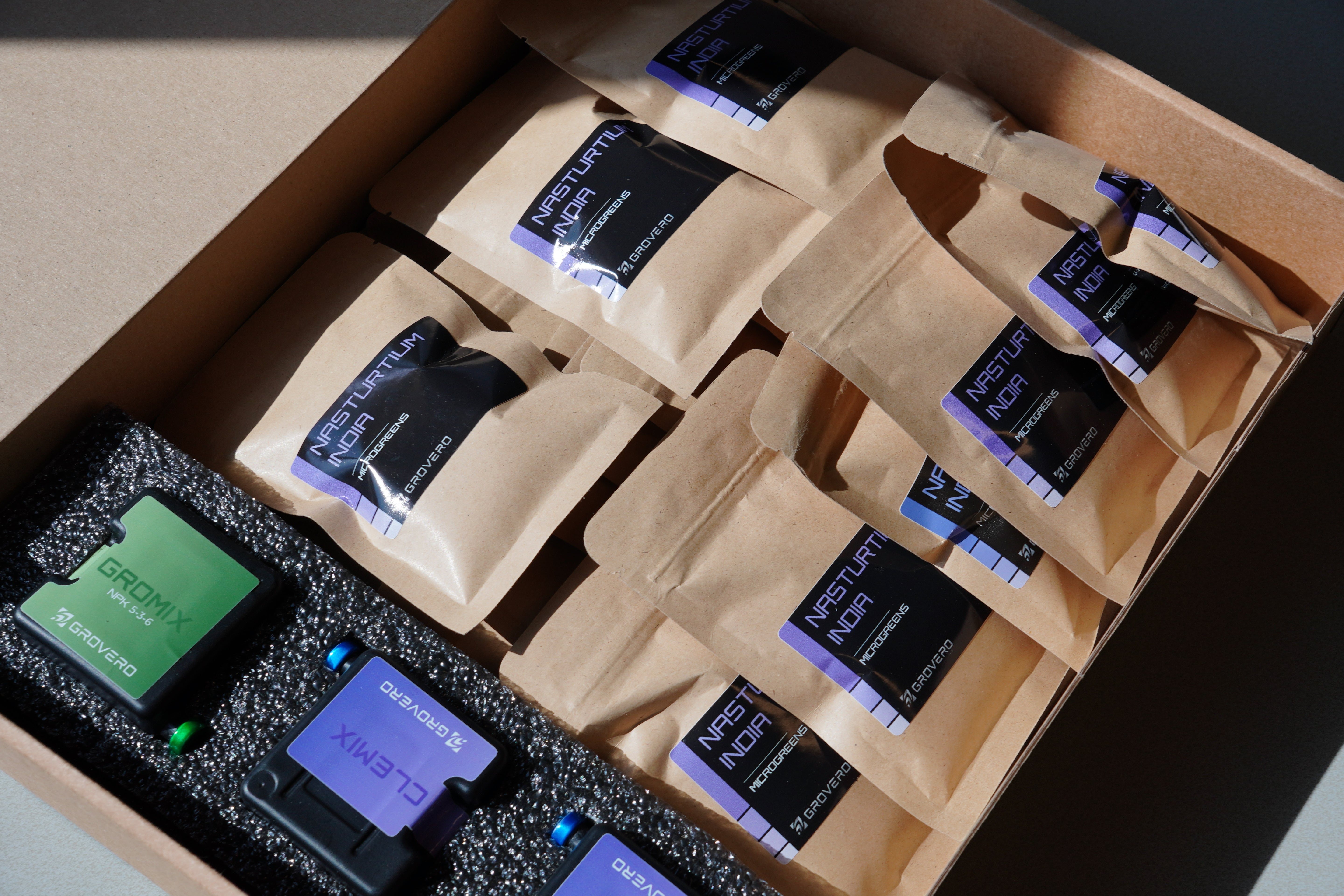 Box containing multiple small packaged seeds and cartridges, as part of Care Plan